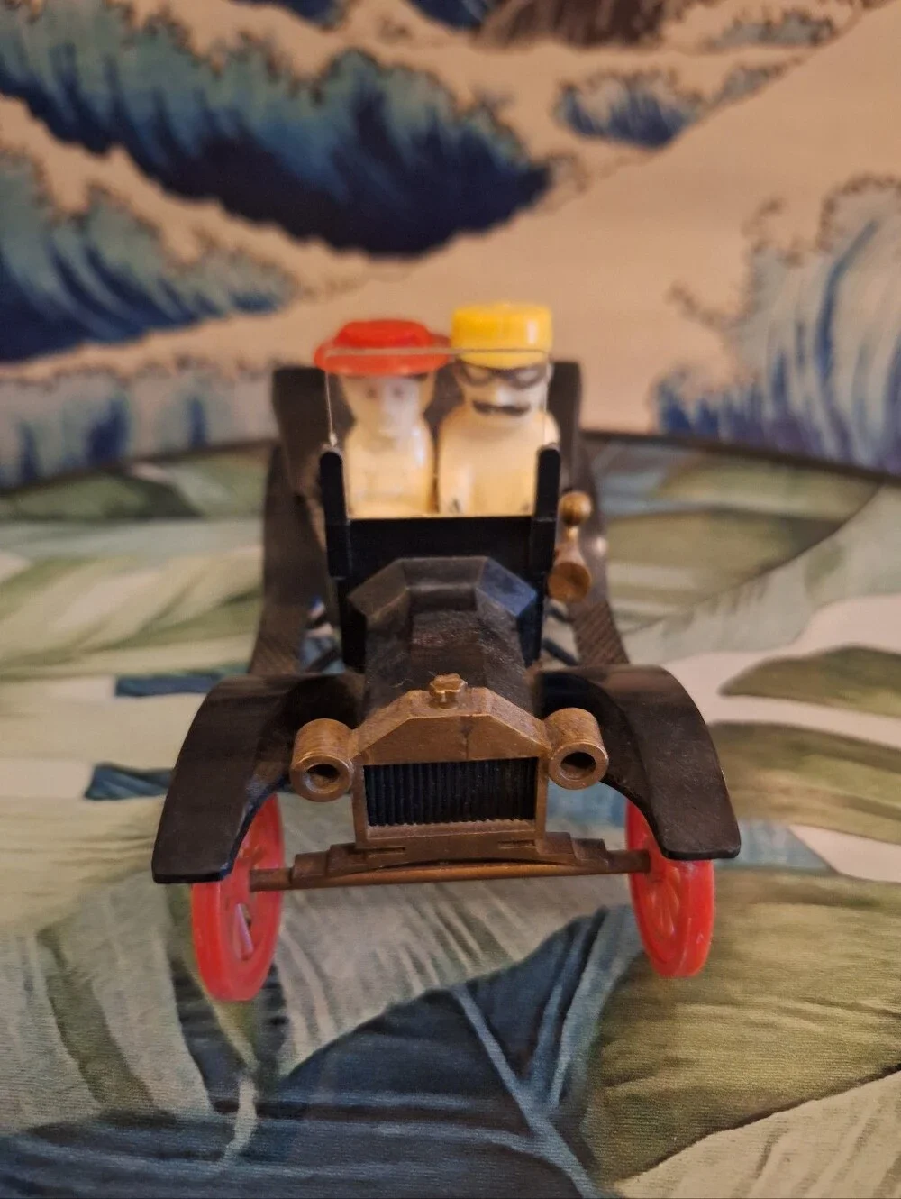Classic Black Salt & Pepper Car with Red Wheels and Yellow/Red Driver Hats